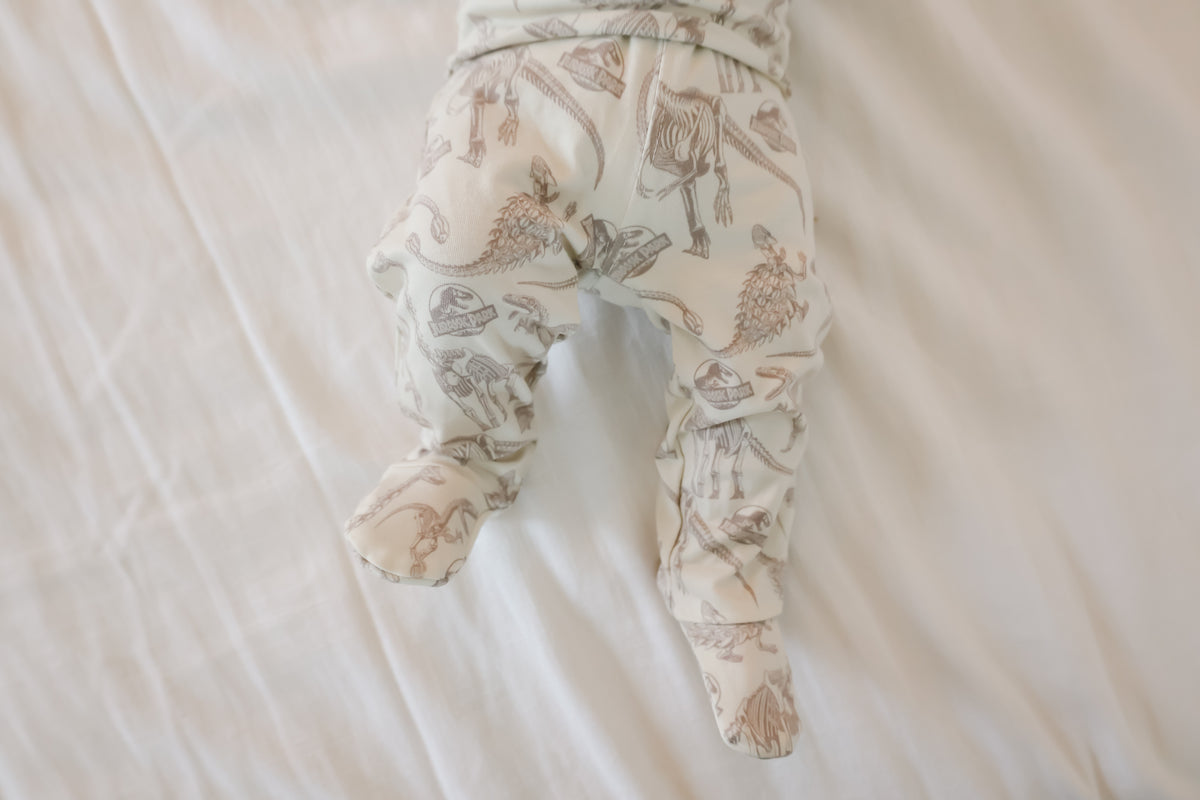 Footed Baby Pants- Jurassic Park Fossils